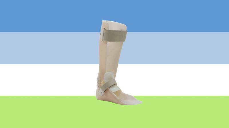 flag with 4 horizontal stripes that are powder blue, periwinkle, white, and green. there is a cutout of a beige colored ankle foot orthotic on the flag.