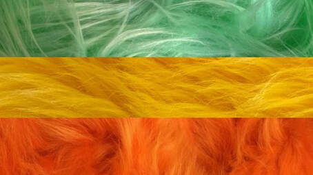 new pan flag with each stripe made of a different image of fur corresponding to each color. flag is 3 stripe mint, yellow, and orange flag. 
