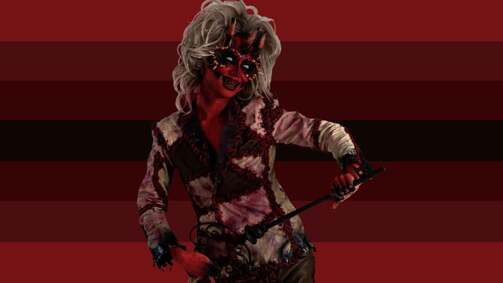 flag with 7 stripes with black in the middle and on either side is dark red stripes that are a gradient. Hoso Terra Toma is on the flag in her Summoned Demon Look. She has teased dirty blonde hair, red skin with black around her eyes that are white, fingers coming out of her forehead, and is wearing a stitched flesh jacket. 