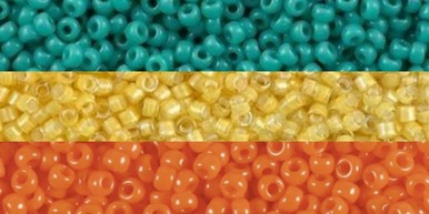 new 3 stripe pan flag with each stripe being replaced by a close up picture of a collection of seed beads with the corresponding stripe color. this is the mint, yellow, and orange flag.